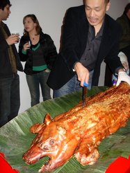 Carving the pig at Baguette Box.JPG